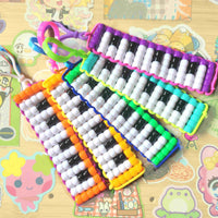 beaded piano keychains